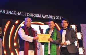 The Governor of Arunachal Pradesh Shri PB Acharya presenting awards on the   occasion of State Tourism Award function at IG Park Itanagar on 31st January�2017.